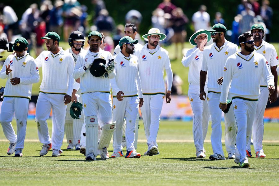 The Pakistan and New Zealand (back) teams walk from the field at the end of the first cricket Test match between New Zealand and Pakistan at Hagley Park in Christchurch on November 20, 2016.  / AFP / Marty MELVILLE        (Photo credit should read MARTY MELVILLE/AFP/Getty Images)