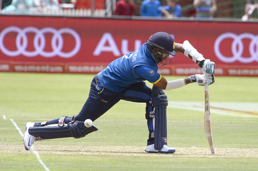 Kusal Mendis of Sri Lanka misses the ball as he bats during their One Day International (ODI) cricket match against South Africa, at St George's Park on January 28, 2017, in Port Elizabeth. / AFP PHOTO / RODGER BOSCH