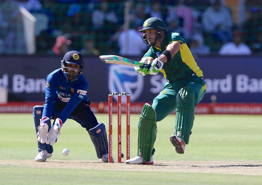 PORT ELIZABETH, SOUTH AFRICA - JANUARY 28: Dinesh Chandimal of Sri Lanka (L) and Faf du Plessis of South Africa during the 1st One Day International match between South Africa and Sri Lanka at St Georges Park on January 28, 2017 in Port Elizabeth, South Africa. (Photo by Richard Huggard/Gallo Images)
