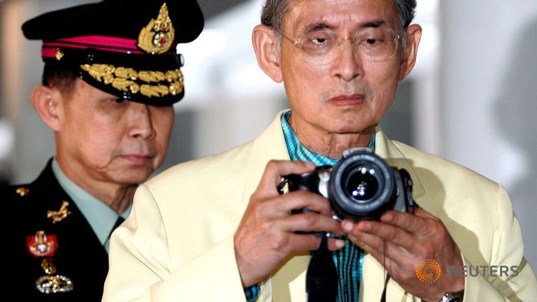 file-photo-of-thailand-s-king-bhumibol-adulyadej-r-taking-a